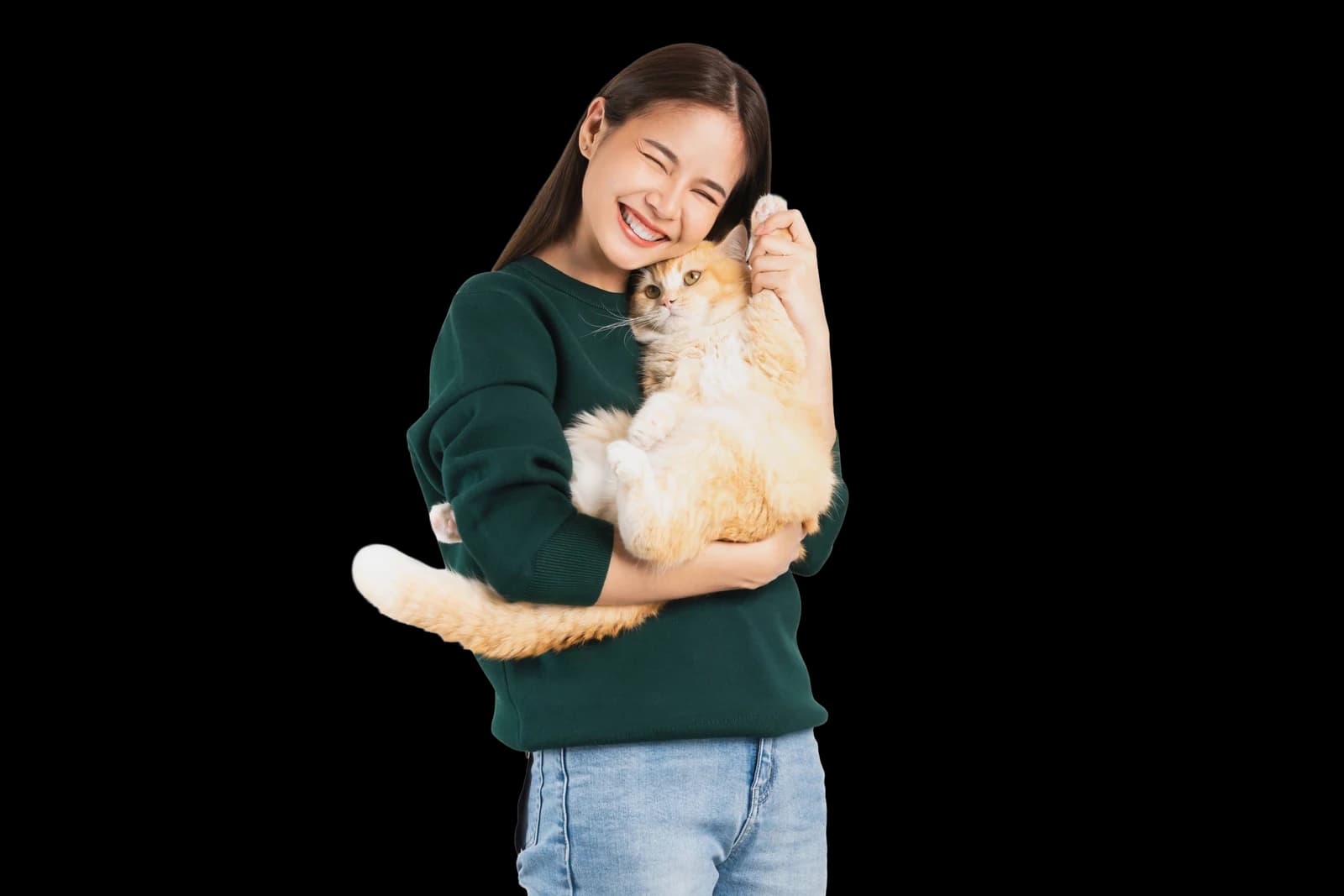 A sitter holding a happy cat